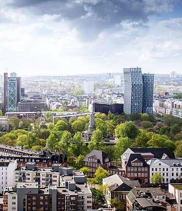 View of the Hamburg skyline with trees in the foreground